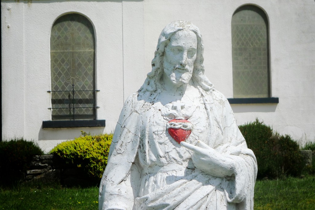 Jesus resides outside a church in rural County Mayo.