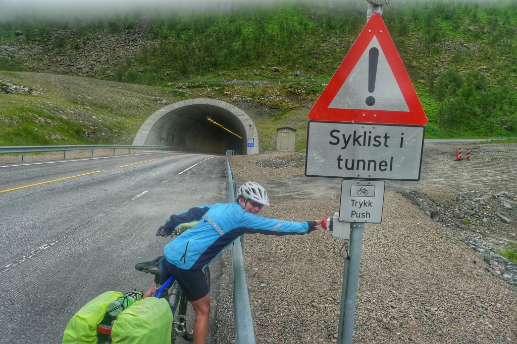 Just outside of Gryllefjord, we had our first long tunnel experience. It was all downhill for 1km. The button activated a flashing light to let drivers know to watch out for us.