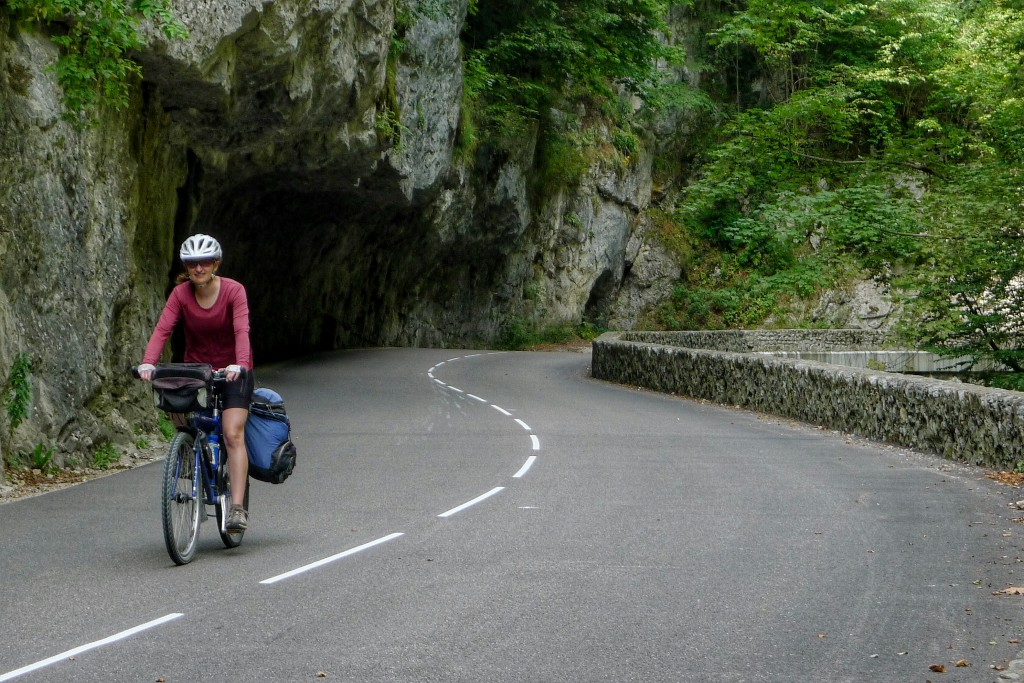 Carrie rides down the Gorges de la Bourne, a road carved into the cliff along the Bourne River