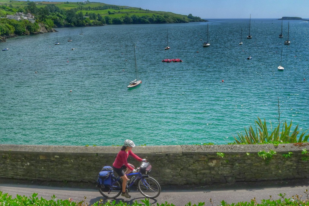 Carrie rides by the harbor of Glandore.
