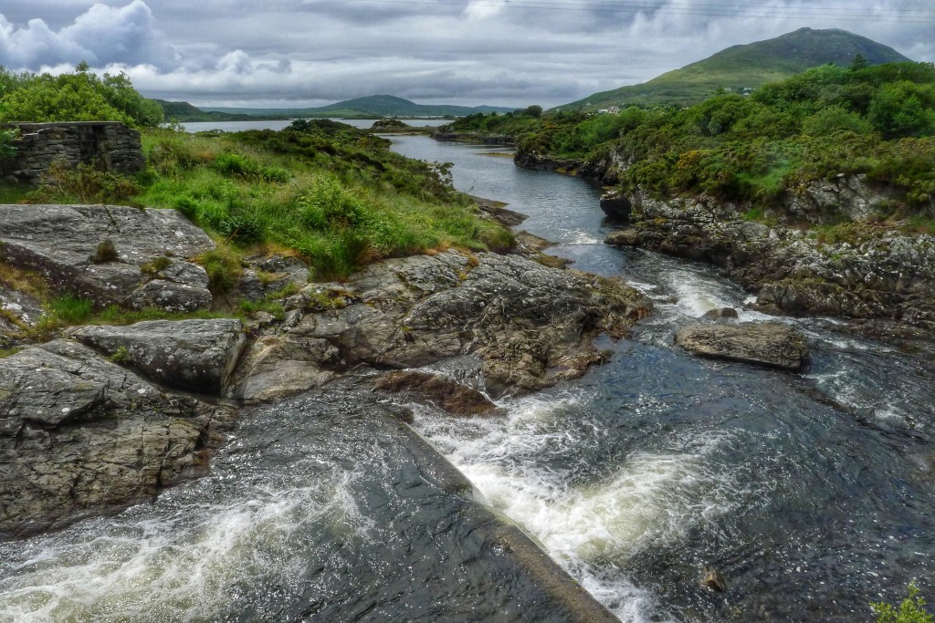 A river spills into the Letterfrack Bay.