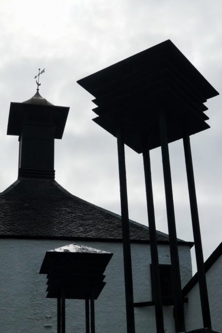 The pagoda at the top of the Bowmore distillery helps direct the peat smoke through the drying barley to infuse the peat and smoke flavor.